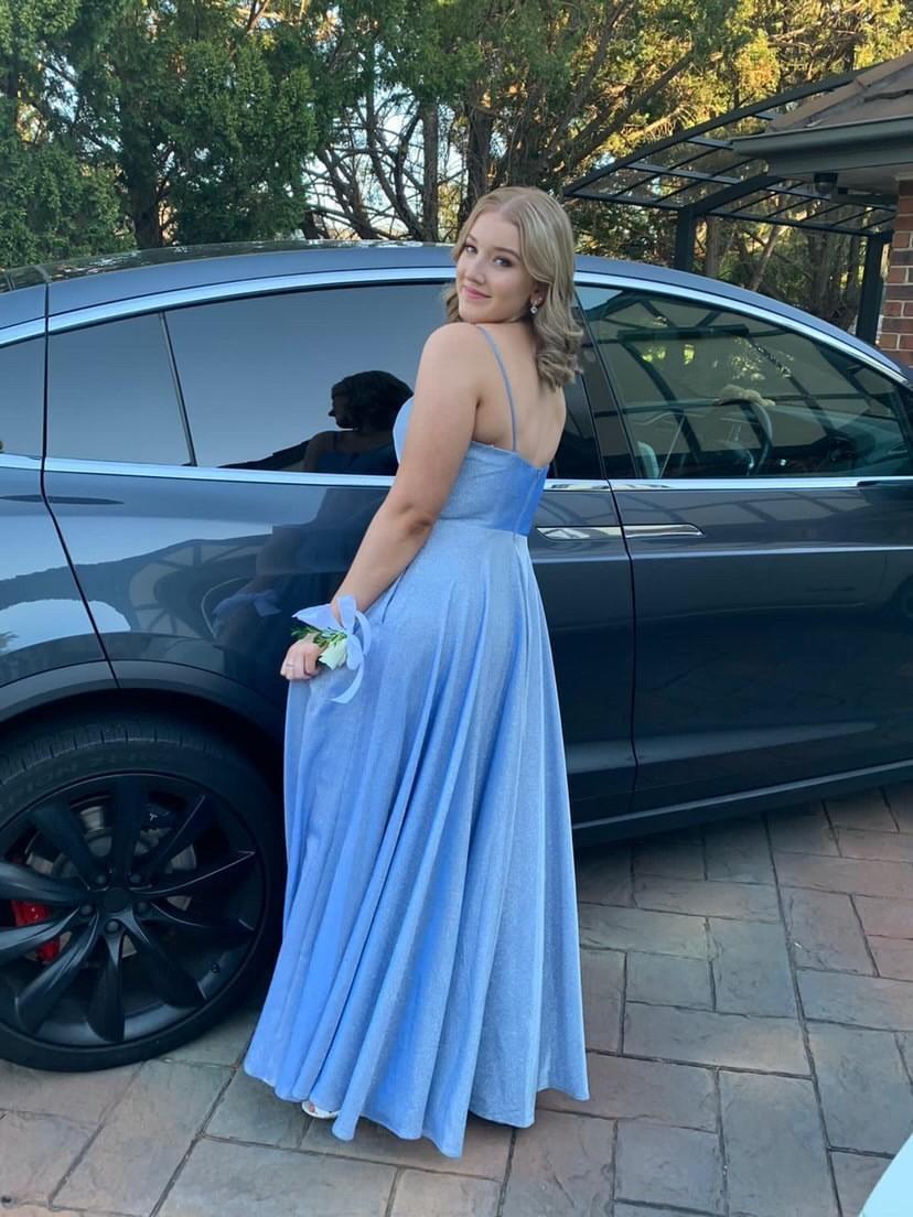 Formal night, blue gown, natural tan on shoulders and back