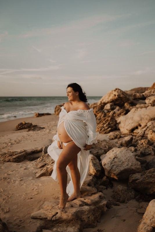 Maternity shoot, ocean rocks silhouette