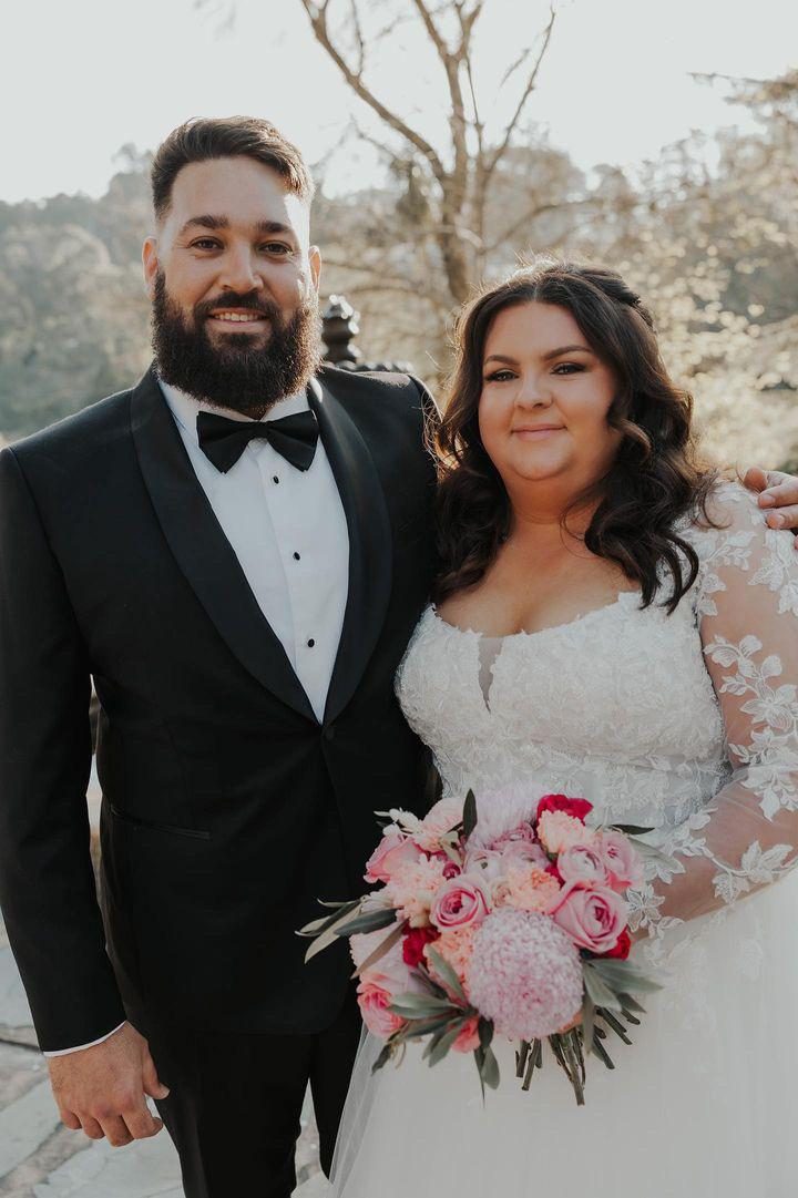 Bride and groom smiling together